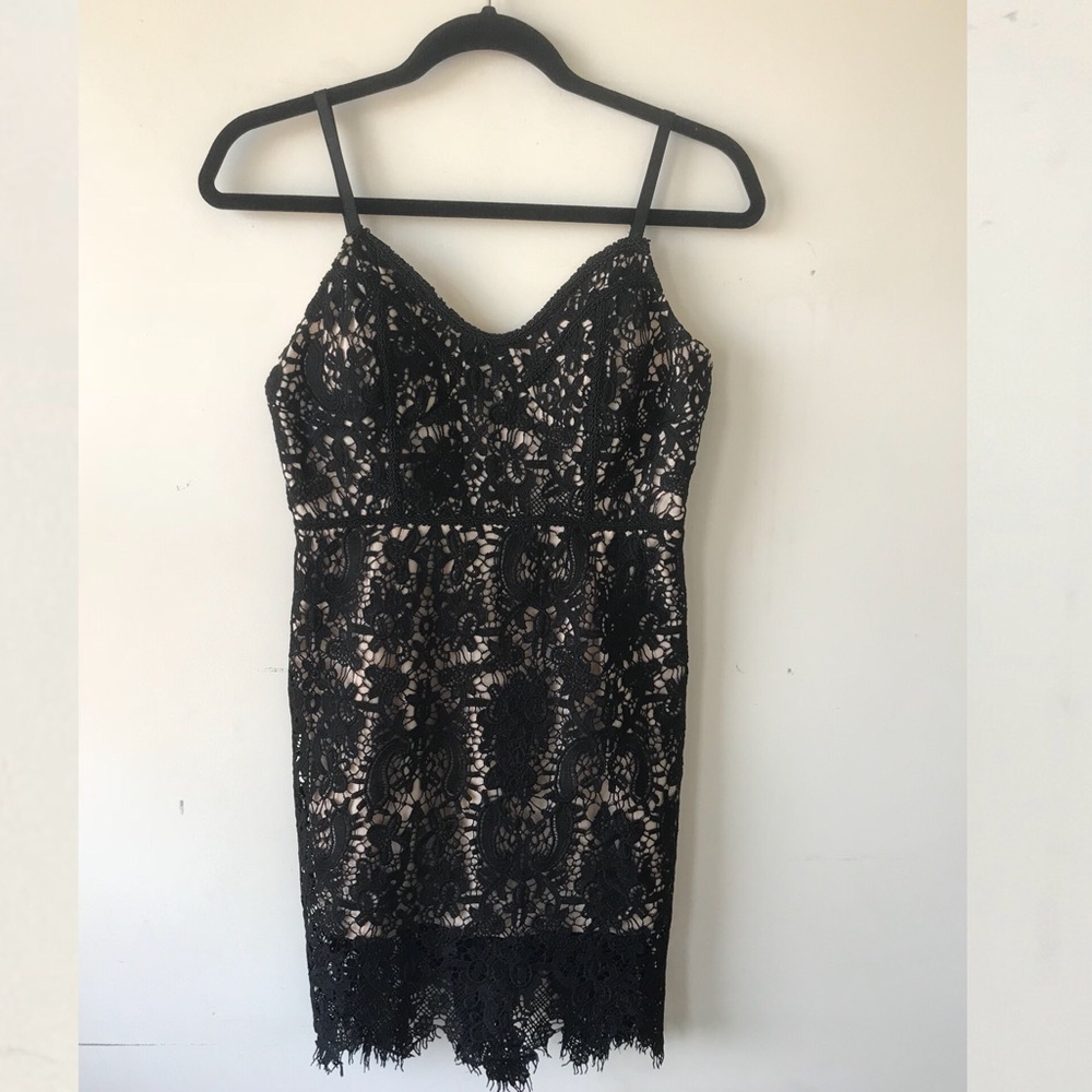 Black lace over nude dress